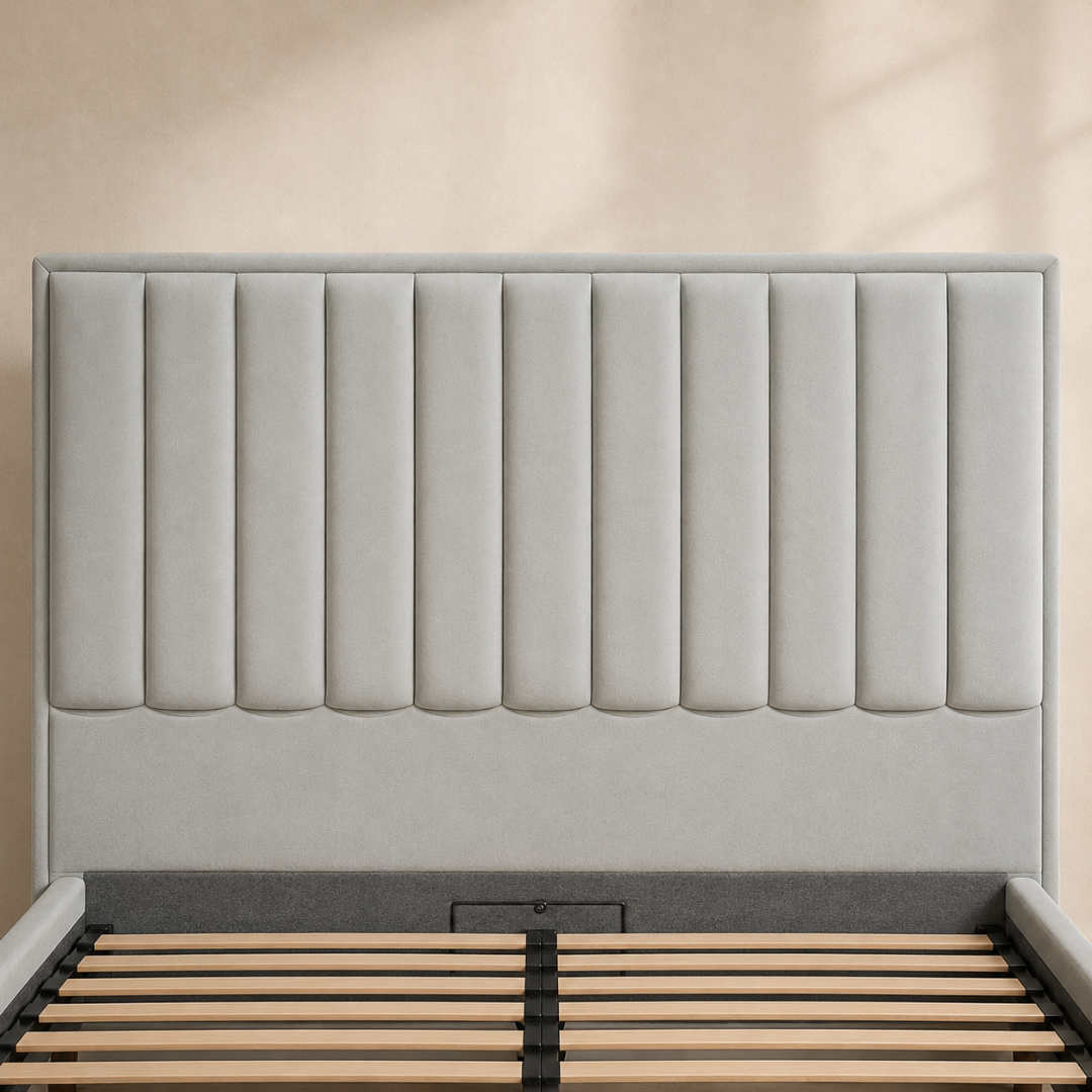 Close view of the AZYZA light grey suede headboard with ten vertical padded channels