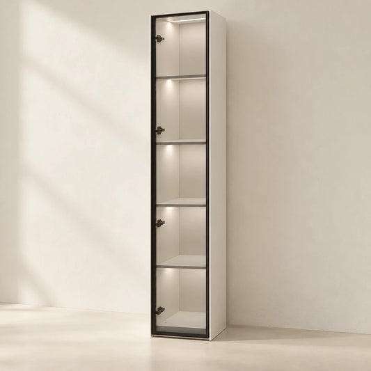 AIDA Silver LED glass cabinet with five illuminated display bays and a dark metallic frame, in a warm ivory studio — styling visualisation