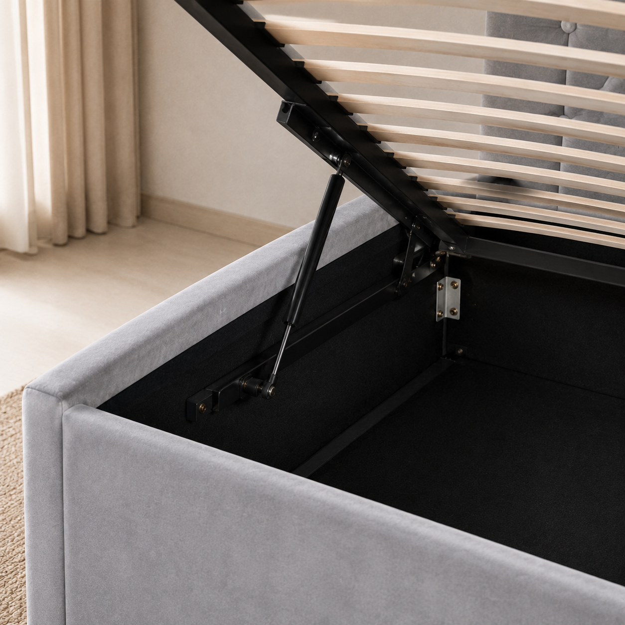 SAFA Velvet Ash Grey storage bed with the gas-lift slatted platform raised above the storage cavity