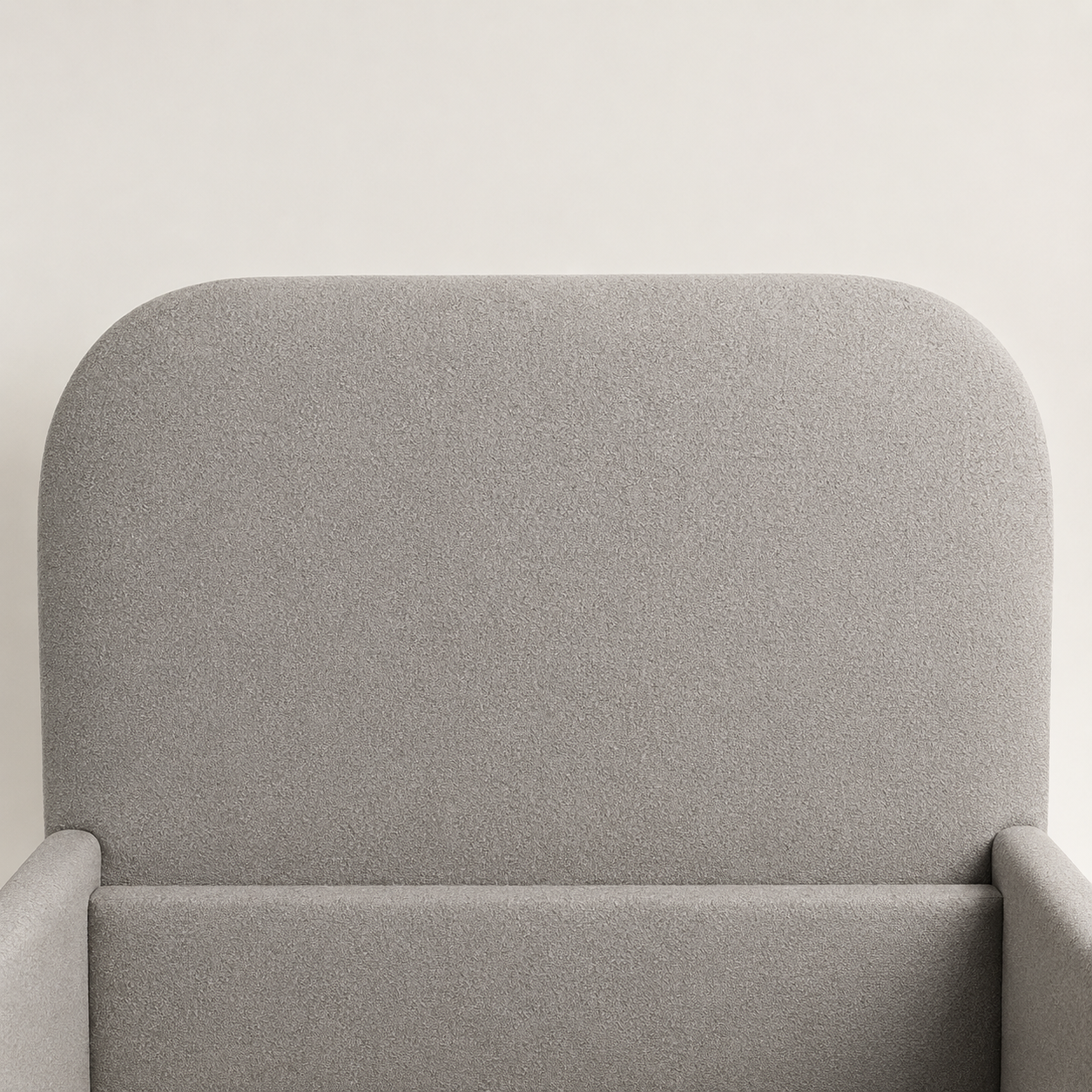 Close view of the seamless rounded ZULFA headboard in premium Cloud Grey textured fabric