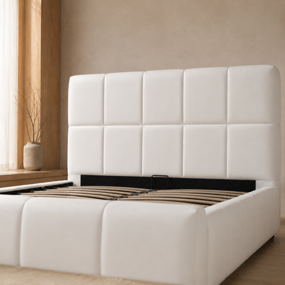 Close view of HUDA's ten broad padded headboard panels and matching five-panel front board in PU White
