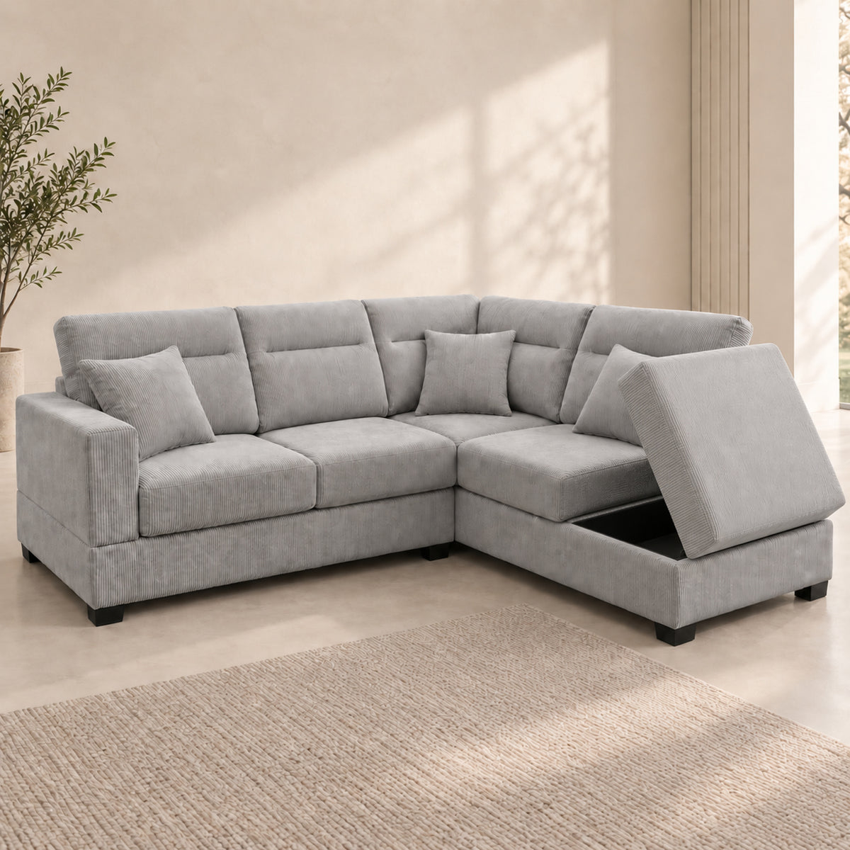 BELLAGIO Grey sofa with the forward chaise cushion opened sideways toward the adjacent seat to reveal storage beneath