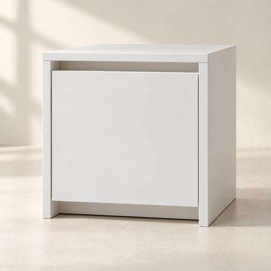 AIDA one-door white handleless storage module, in a warm ivory studio — styling visualisation