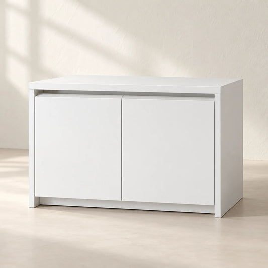 AIDA two-door white handleless storage module, in a warm ivory studio — styling visualisation