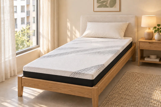 CoreComfort Single narrow low-profile mattress in a compact city bedroom — styling visualisation