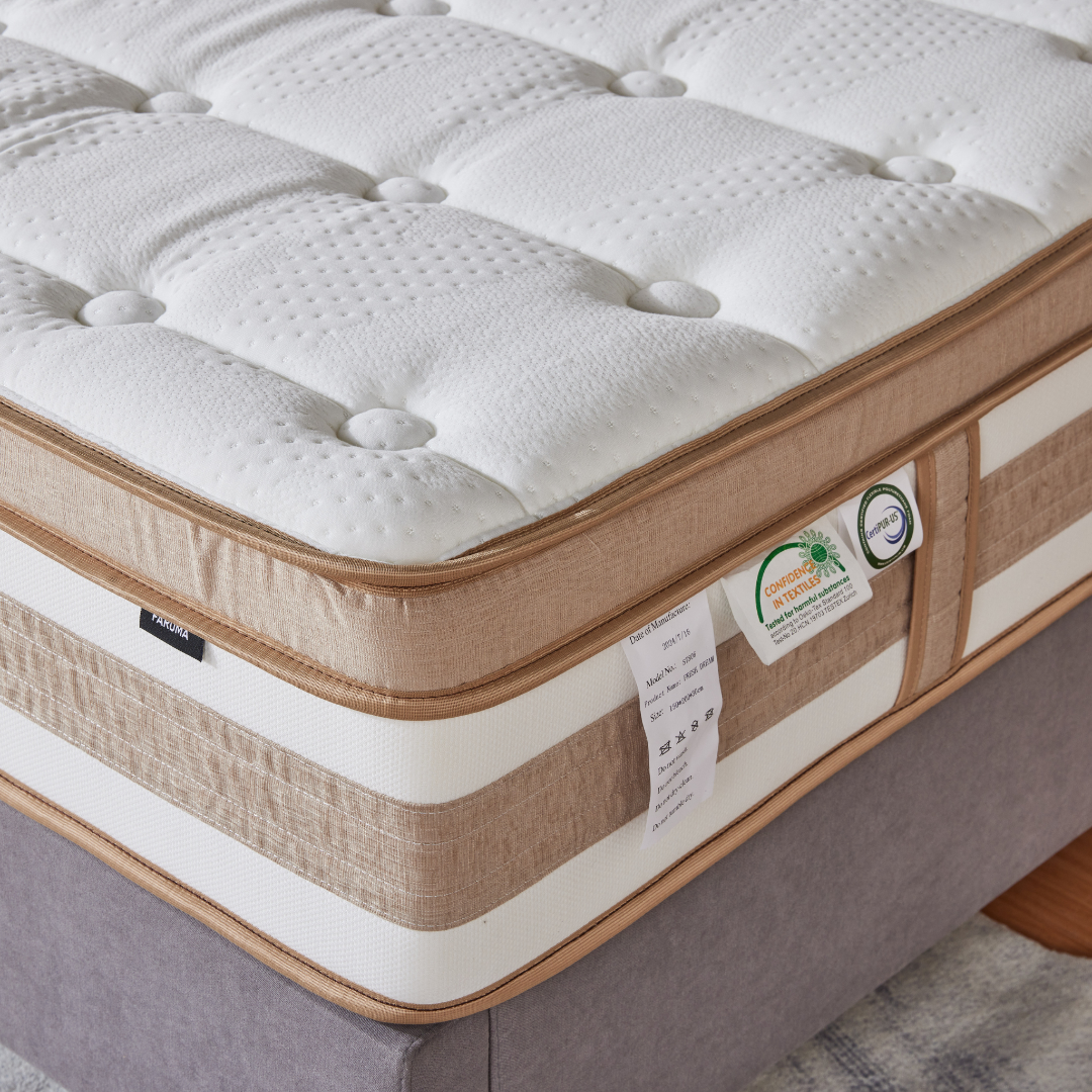 Ivory tufted surface and warm taupe side detailing of the Fresh Dream mattress
