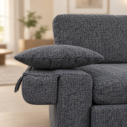 MINIMO Grey sofa bed fold-down side armrest supporting its loose cushion

